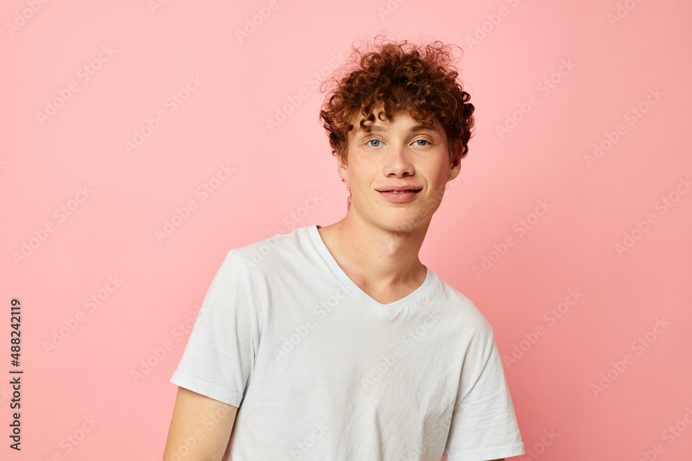 cute red-haired guy posing youth style white t-shirt isolated background unaltered cute red-haired guy posing youth style white t-shirt isolated background unaltered