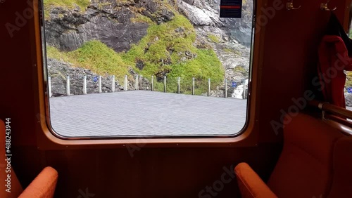 View of a waterfall from a train window