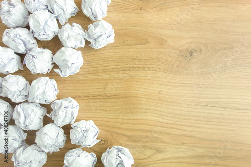 Crumpled paper balls on desk