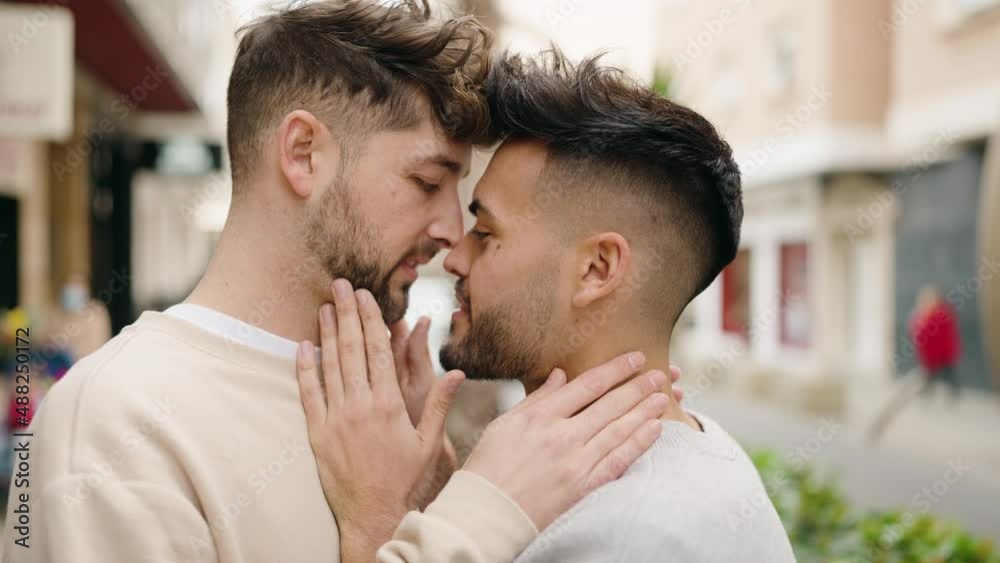 Young couple smiling confident hugging each other at street Young couple smiling confident hugging each other at street