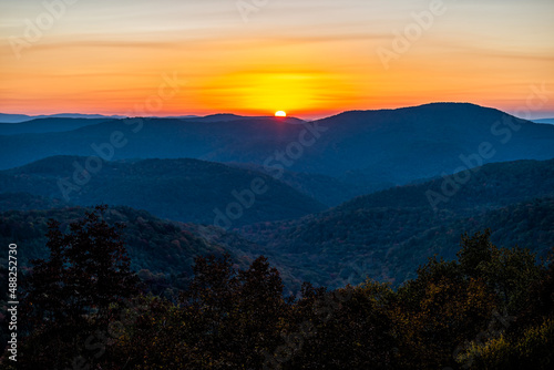 Autumn season foliage with sunrise morning at Highland Scenic highway 150 road in West Virginia Monongahela National Forest Appalachian Mountains