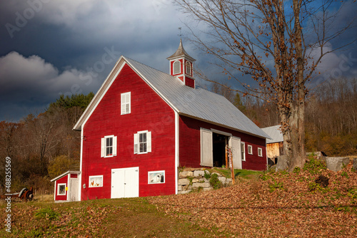 A red barn with coupela in rural Vermont near Strafford © Bob