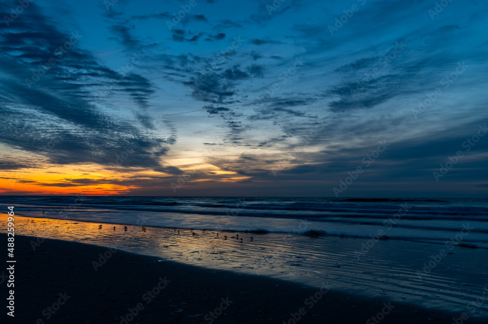 Colorful Morning Twilight over Beach and Ocean