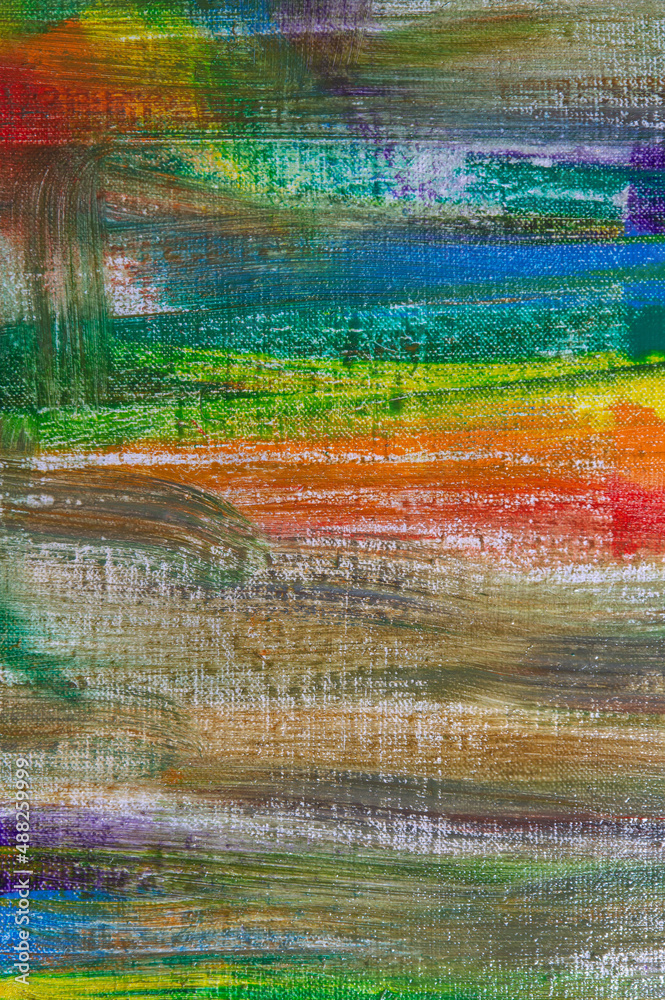abstract rainbow multicolored background formed by erasing paints from the canvas, short focus. Not an art object, temporary effect.