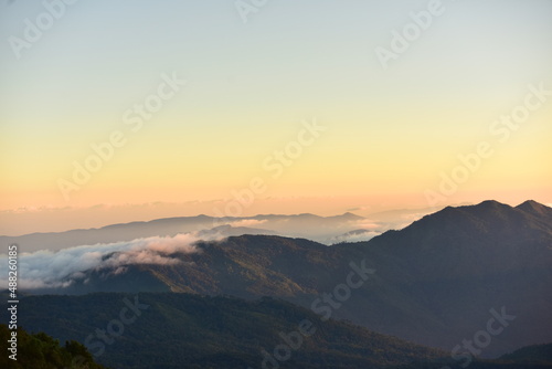 mountain peak at sunrise © tharathip