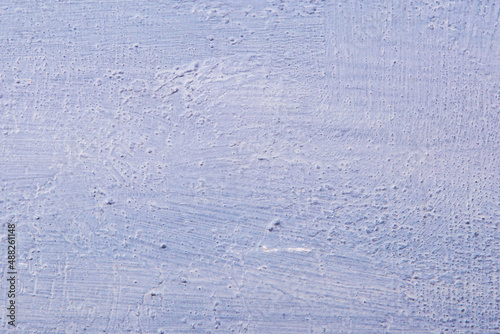 abstract background: light textured plaster, color toning, close