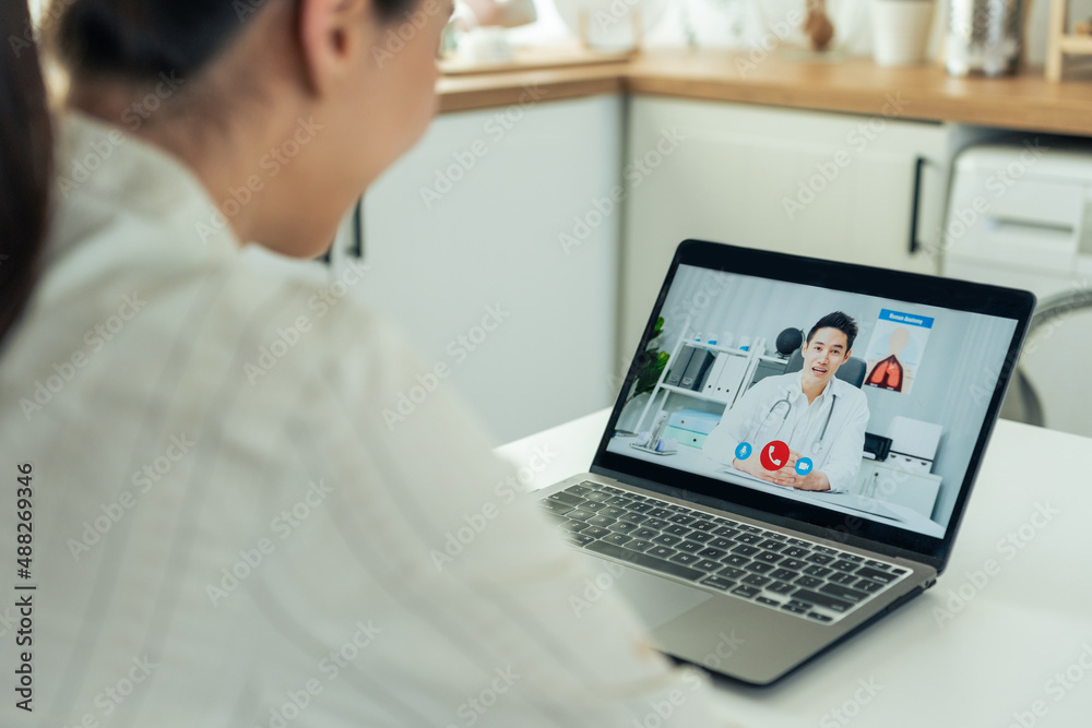 Asian young woman patient talking virtual online with medical doctor. 