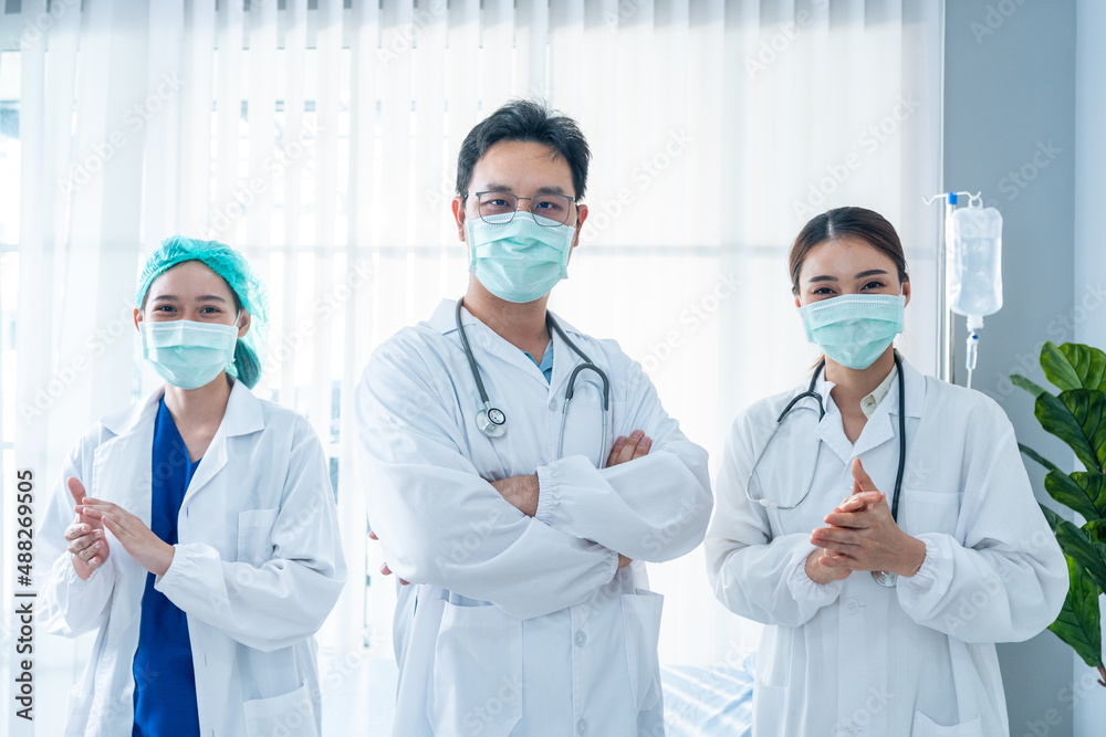 Portrait Group of Asian doctor and nurse clapping the hands with smile. Portrait Group of Asian doctor and nurse clapping the hands with smile.