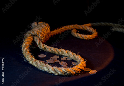 Obraz na plátne a noose gallows and 30 silver pieces on a black background