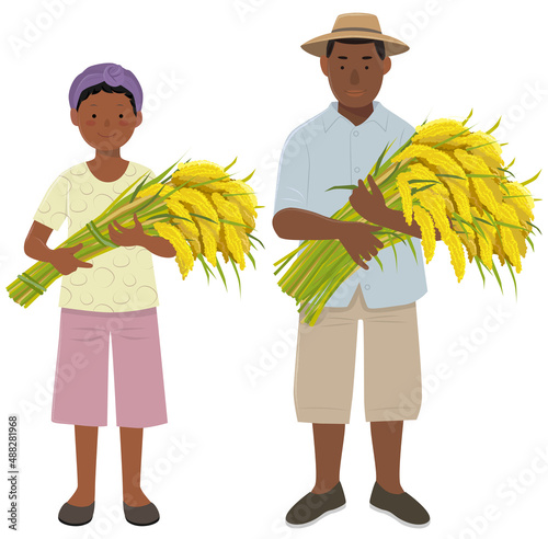 Young black men and women standing holding a rice bundle