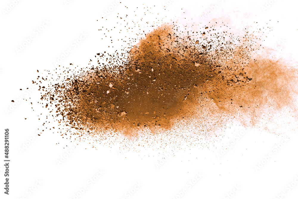 Brown powder explosion isolated on white background.