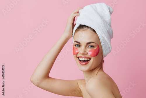 woman skin care face patches bare shoulders isolated background