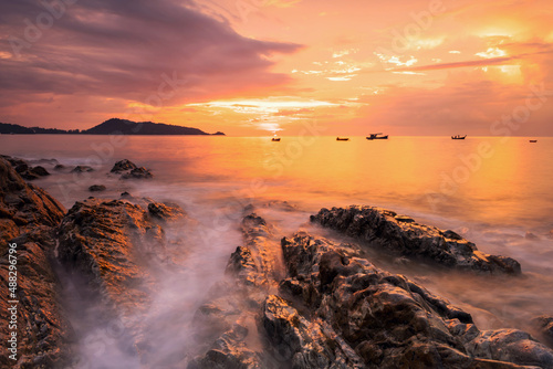 sunset seascape with motion wave, Kalim beach