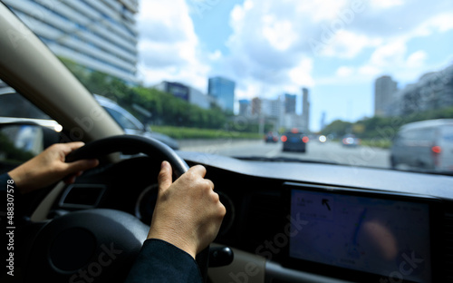 Wallpaper Mural People driving car on city road Torontodigital.ca