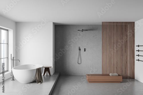 Bright bathroom interior with shower  bathtub  window  wooden partition  bench