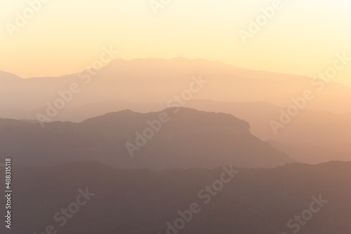Sunrise over the ridges. © J