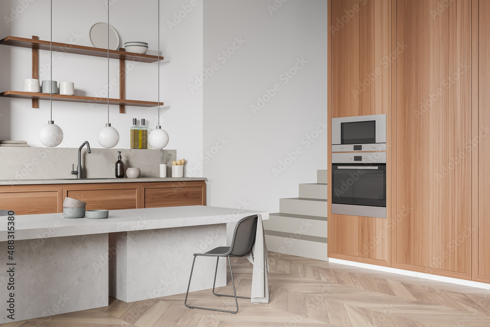 Fototapeta premium Top view of light kitchen interior with table and stairs, kitchenware