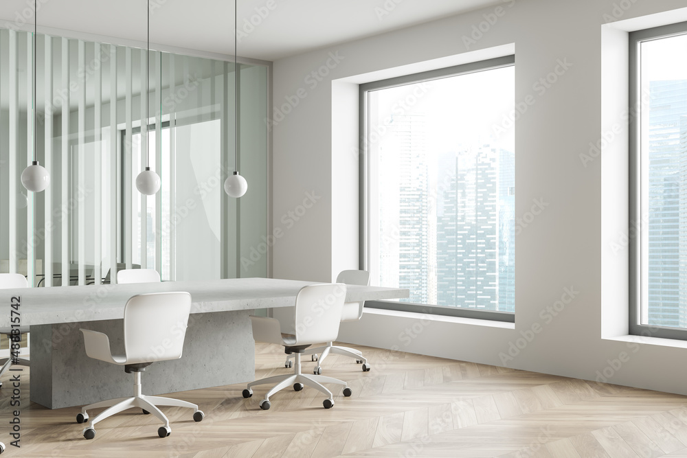 Fototapeta premium Office room interior with seats, table and panoramic window with city view