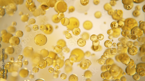 Oil Bubbles on Golden Backg...