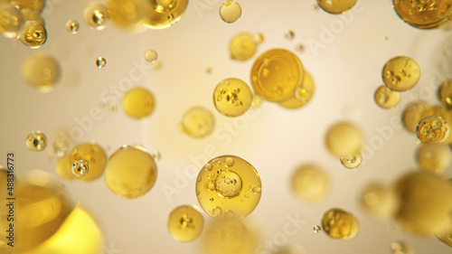 Oil Bubbles on Golden Backg...