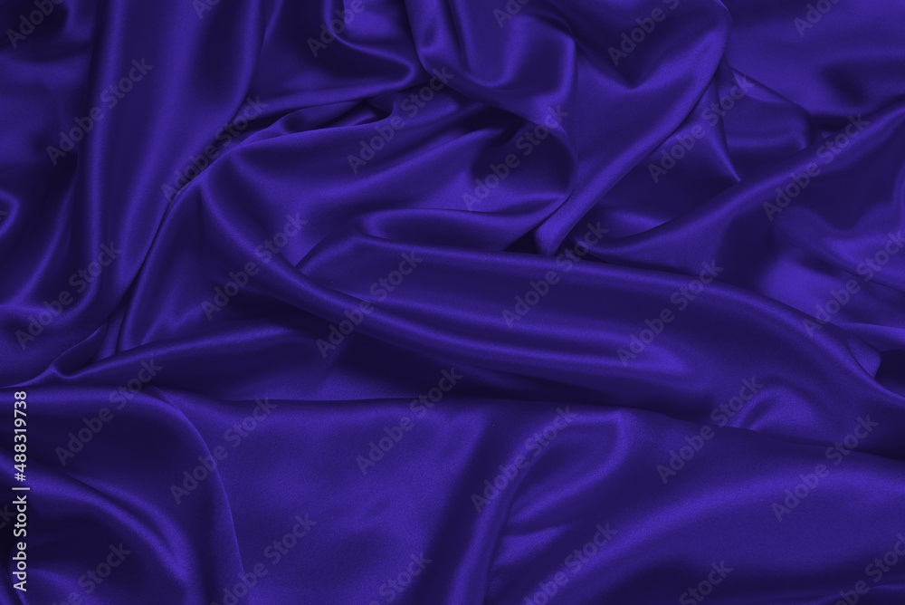 Purple silk or satin luxury fabric texture can use as abstract background. Purple silk or satin luxury fabric texture can use as abstract background.