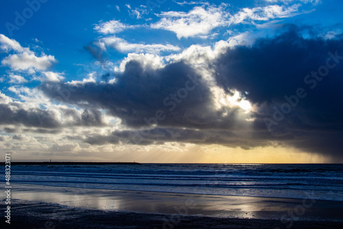 Sunset cloud formations with light rays