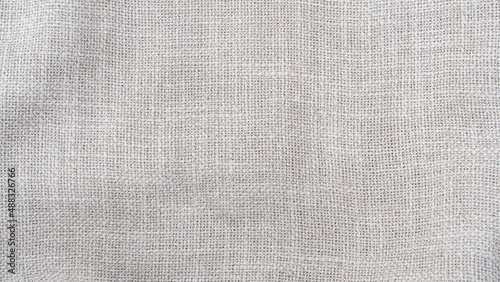 Schilderij op canvas Jute hessian sackcloth woven burlap texture background in sepia cream old aged b