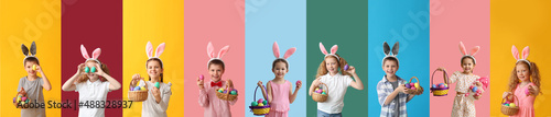 Photographie Set of cute children with bunny ears and Easter eggs on colorful background