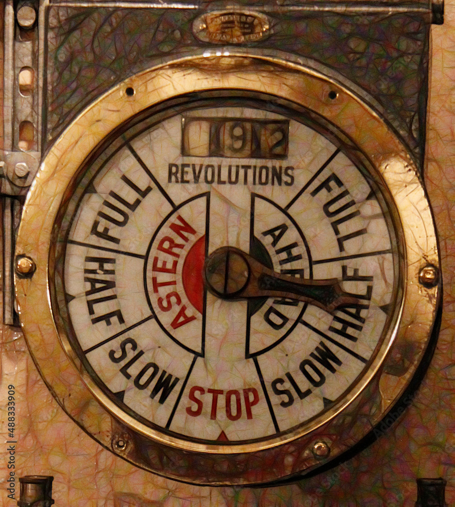 ship speed and direction on movement control dial within a brass circular frame