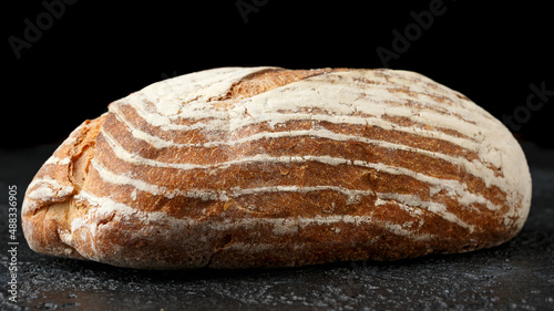 Bread, traditional sourdough bread on a rustic table