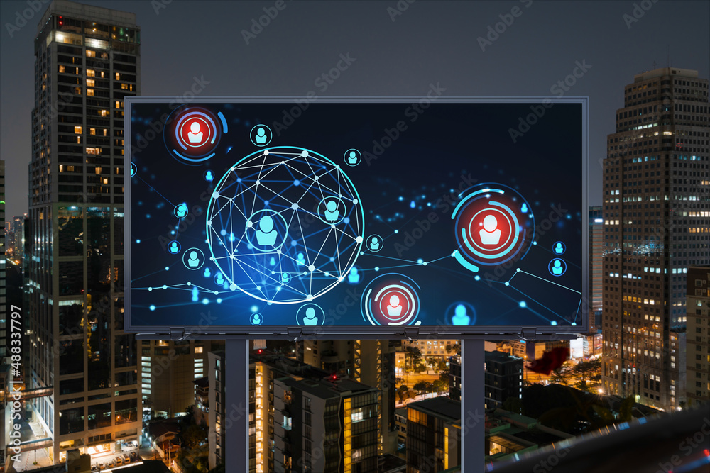 Fototapeta premium Glowing Social media icons on billboard over night panoramic city view of Bangkok. The concept of networking and establishing new connections between people and businesses in Southeast Asia