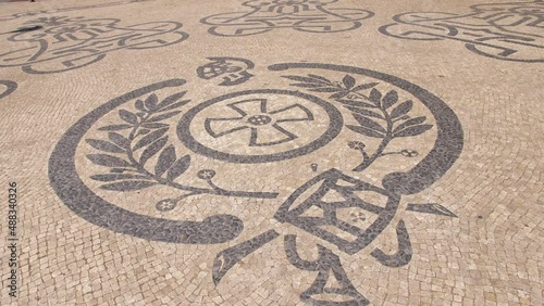 typical portuguese cobblestone pavement in Lisbon Portugal 4k