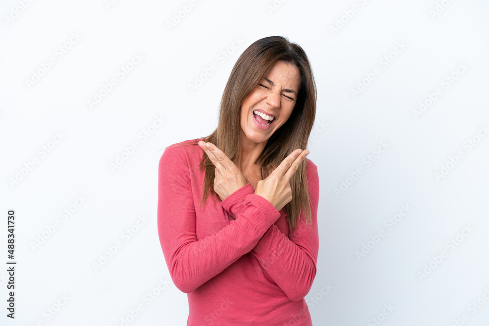 Middle age caucasian woman isolated on white background smiling and showing victory sign Middle age caucasian woman isolated on white background smiling and showing victory sign