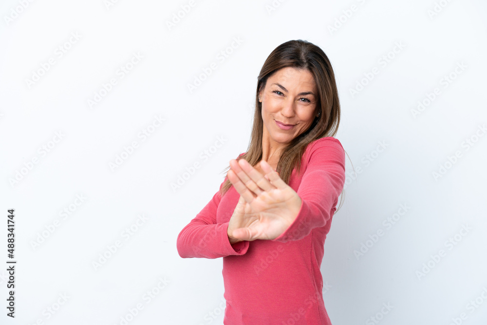 Middle age caucasian woman isolated on white background nervous stretching hands to the front Middle age caucasian woman isolated on white background nervous stretching hands to the front