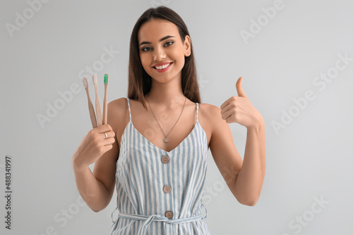 Young woman with bamboo bru...