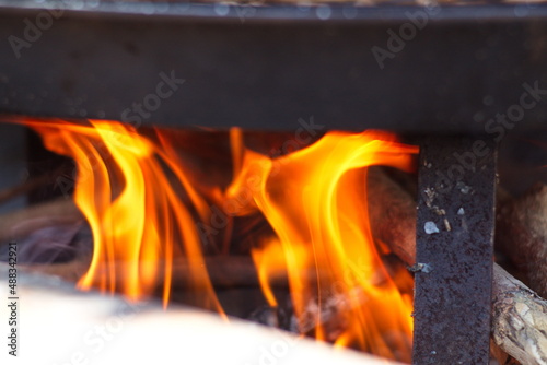 Colorful fire prepared to cook rice with ribs to share with friends in good company