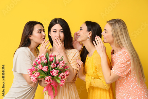 Beautiful gossiping women w...