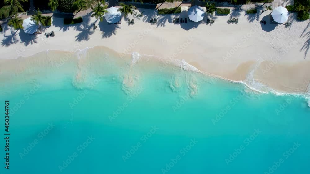 Aerial top down view of the turquoise sea of Cape Santa Maria beach on Long Island, The Bahamas