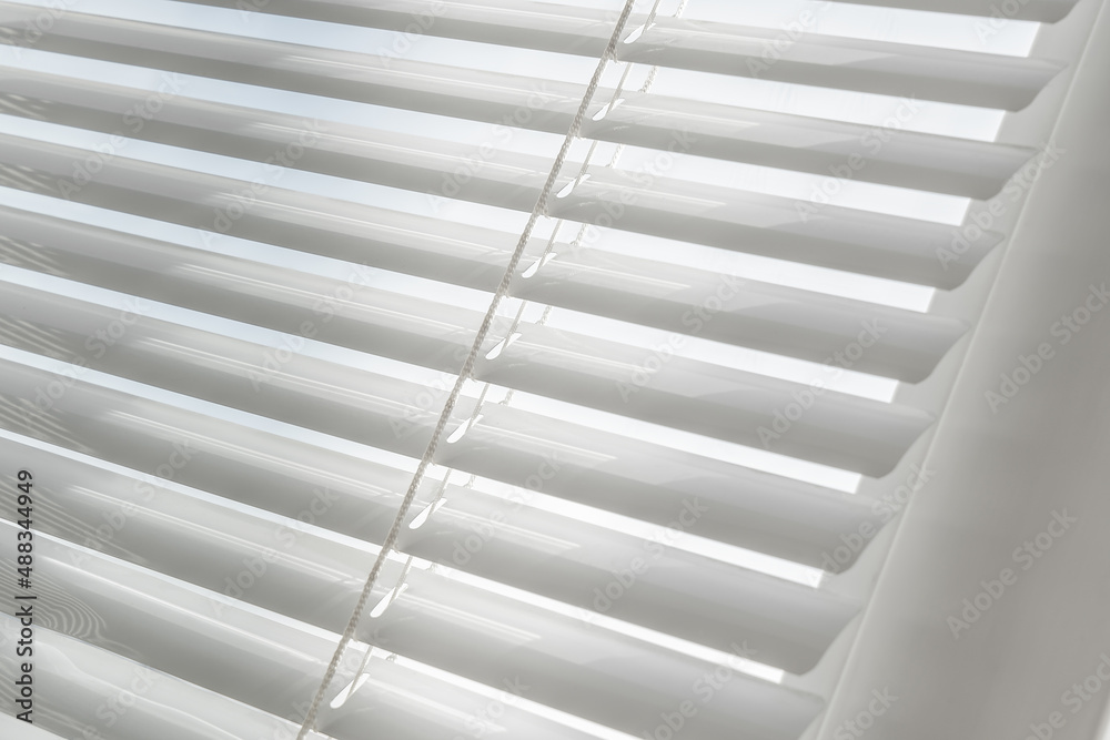Closed window white shutter blinds Closed window white shutter blinds