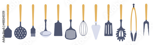 Kitchen utensils icons set in cartoon style. Collection of Silicone Kitchen tools with wooden handles. Bundle of cooking utensils items. Vector illustration photo