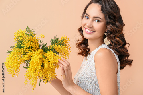 Beautiful young woman with ...