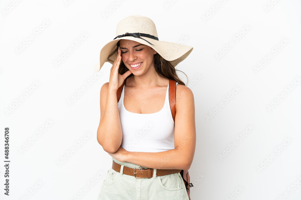 Young caucasian woman wearing a Pamela in summer holidays isolated on white background laughing Young caucasian woman wearing a Pamela in summer holidays isolated on white background laughing