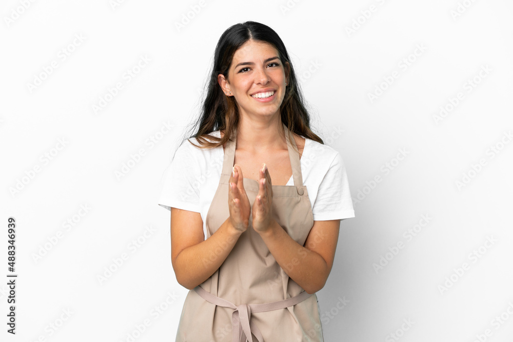 Restaurant waiter over isolated white background applauding after presentation in a conference Restaurant waiter over isolated white background applauding after presentation in a conference