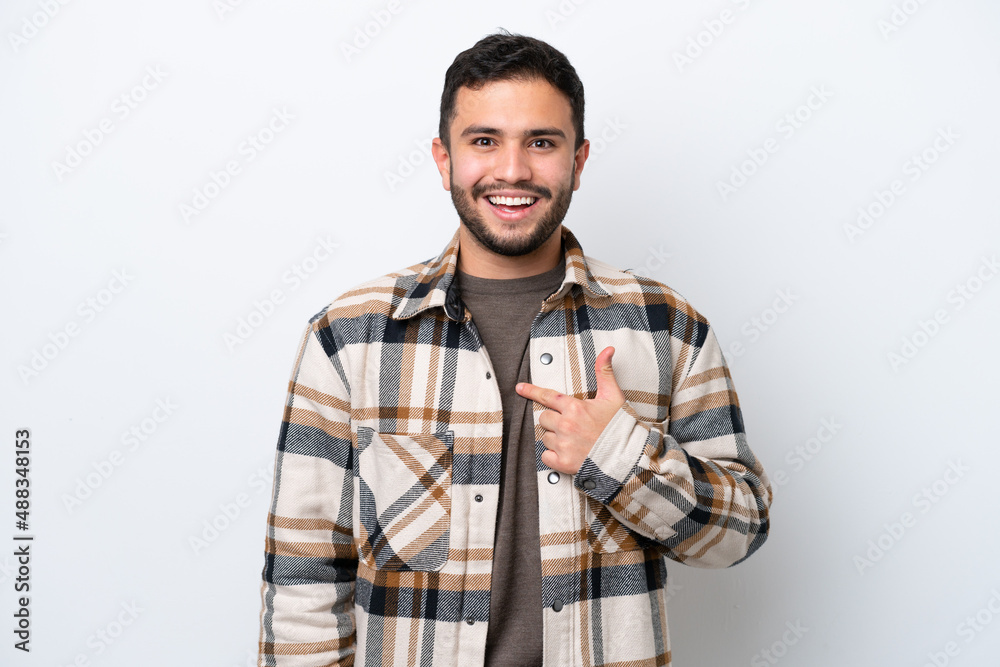 Young Brazilian man isolated on white background with surprise facial expression Young Brazilian man isolated on white background with surprise facial expression