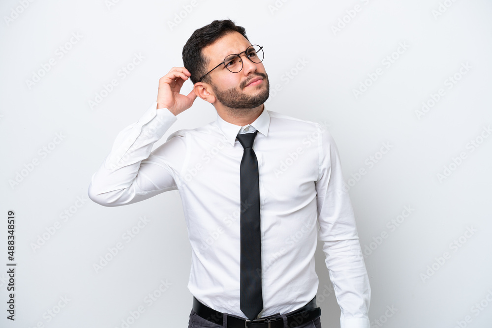 Business Brazilian man isolated on white background having doubts and with confuse face expression Business Brazilian man isolated on white background having doubts and with confuse face expression