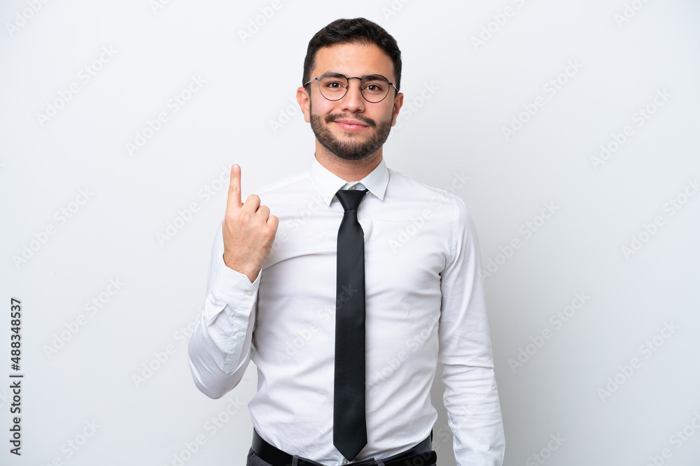 Business Brazilian man isolated on white background pointing with the index finger a great idea Business Brazilian man isolated on white background pointing with the index finger a great idea