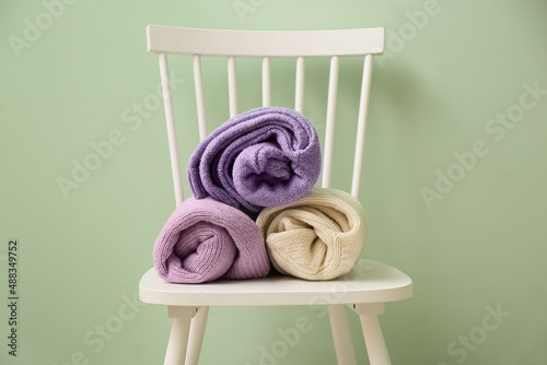 Rolled knitted sweaters in ...