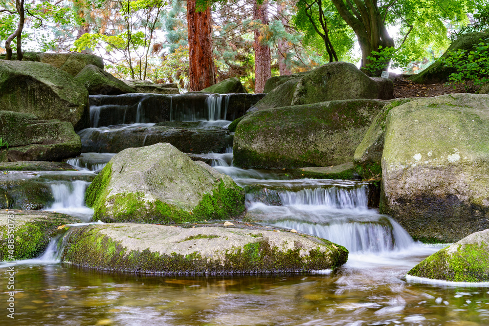 Fototapeta premium Small waterfall in public zen garden