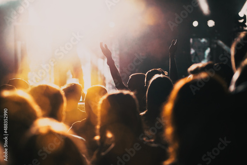 Принти на полотні crowd with raised hands at concert - summer music festival