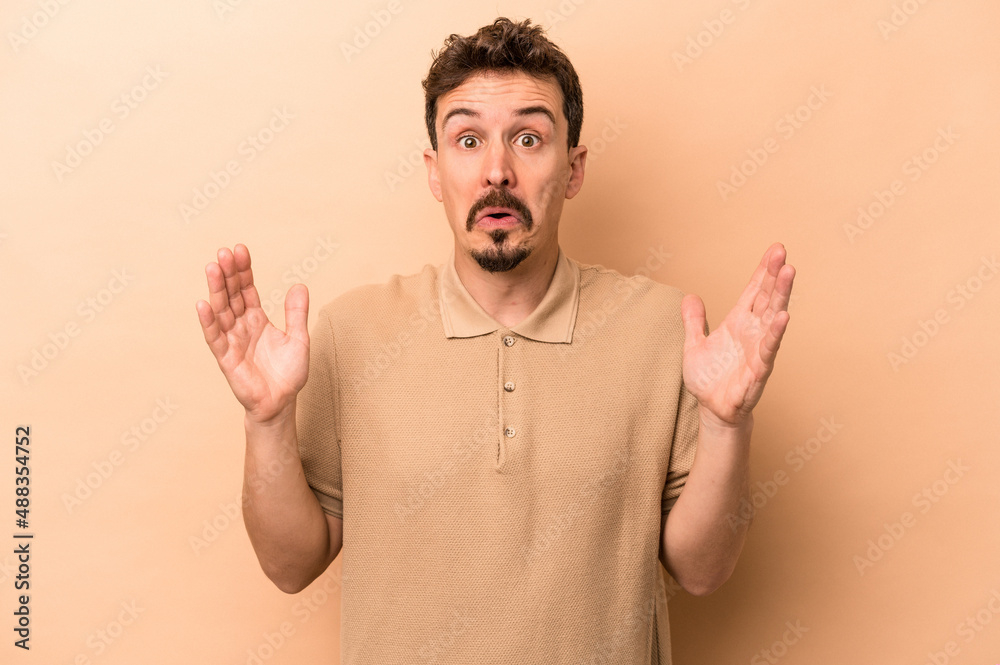 Young caucasian man isolated on beige background having an idea, inspiration concept. Young caucasian man isolated on beige background having an idea, inspiration concept.